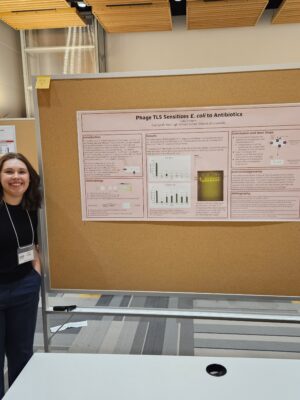 Janesville Research Institute student showing her Phage TLS Sensitizes E. Coli to Antibiotics project