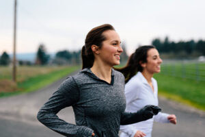 Running Women Jogging in Country