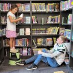 Some of Mr. Yost's high school classes came to read to us during library class!