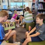 Some of Mr. Yost's high school classes came to read to us during library class!