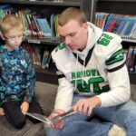 Some of Mr. Yost's high school classes came to read to us during library class!