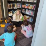 Some of Mr. Yost's high school classes came to read to us during library class!