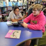 Some of Mr. Yost's high school classes came to read to us during library class!