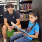 Some of Mr. Yost's high school classes came to read to us during library class!