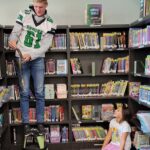 Some of Mr. Yost's high school classes came to read to us during library class!