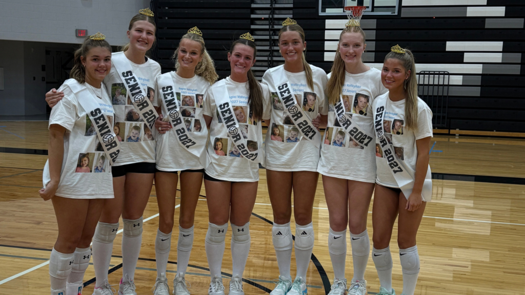 7 Grand Rapids Christian volleyball seniors standing together on senior night.