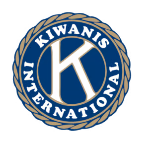 Blue circular emblem with a large white "K" in the center, surrounded by the words "KIWANIS INTERNATIONAL" in white, edged by a braided gold border.